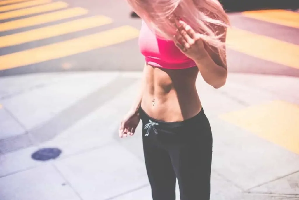 Woman with toned stomach after LA-EMS Body Sculpting Treatment Port Glasgow